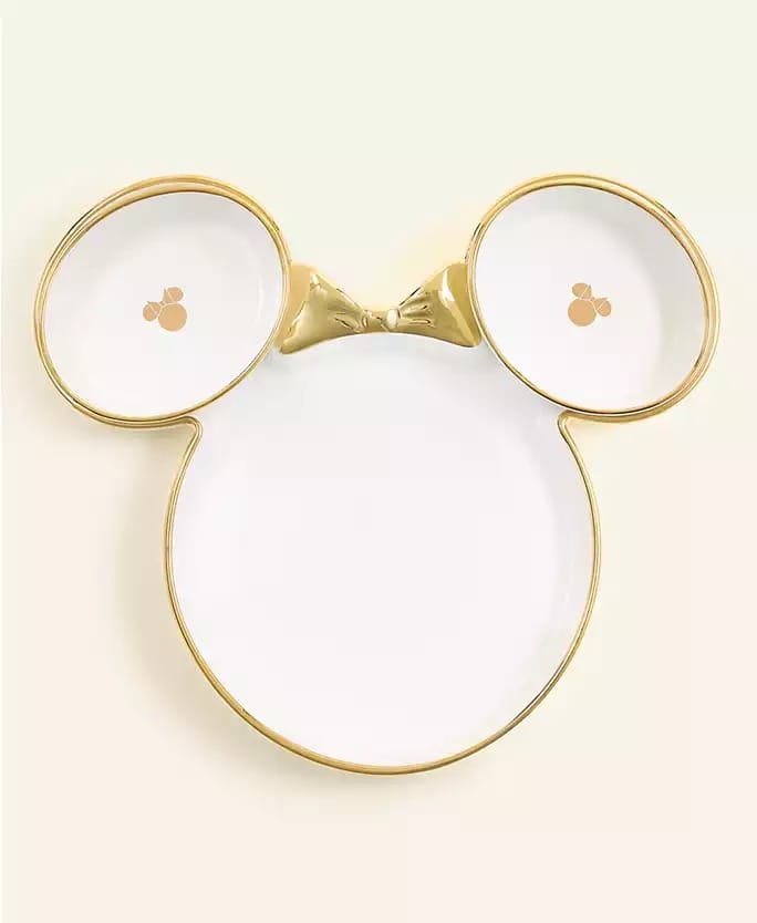 Mouse head-shaped white plate with gold trim, Disney vibes, 2025 holiday collection, fruit designs in each ear.