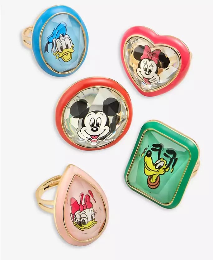 Five Disney Holiday rings with Mickey, Minnie, Donald, Goofy & Daisy—icons seen at Disney parks near every castle worldwide.