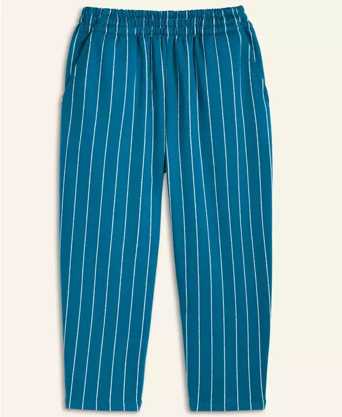 Blue pants with white pinstripes and an elastic waistband, reminiscent of Main Street Cast Members’ attire at Disney Parks.