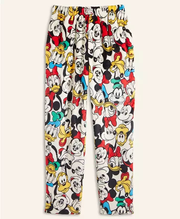 Colorful Disney Holiday pajama pants with classic characters like Mickey and Donald, similar to styles found at Disney Parks.