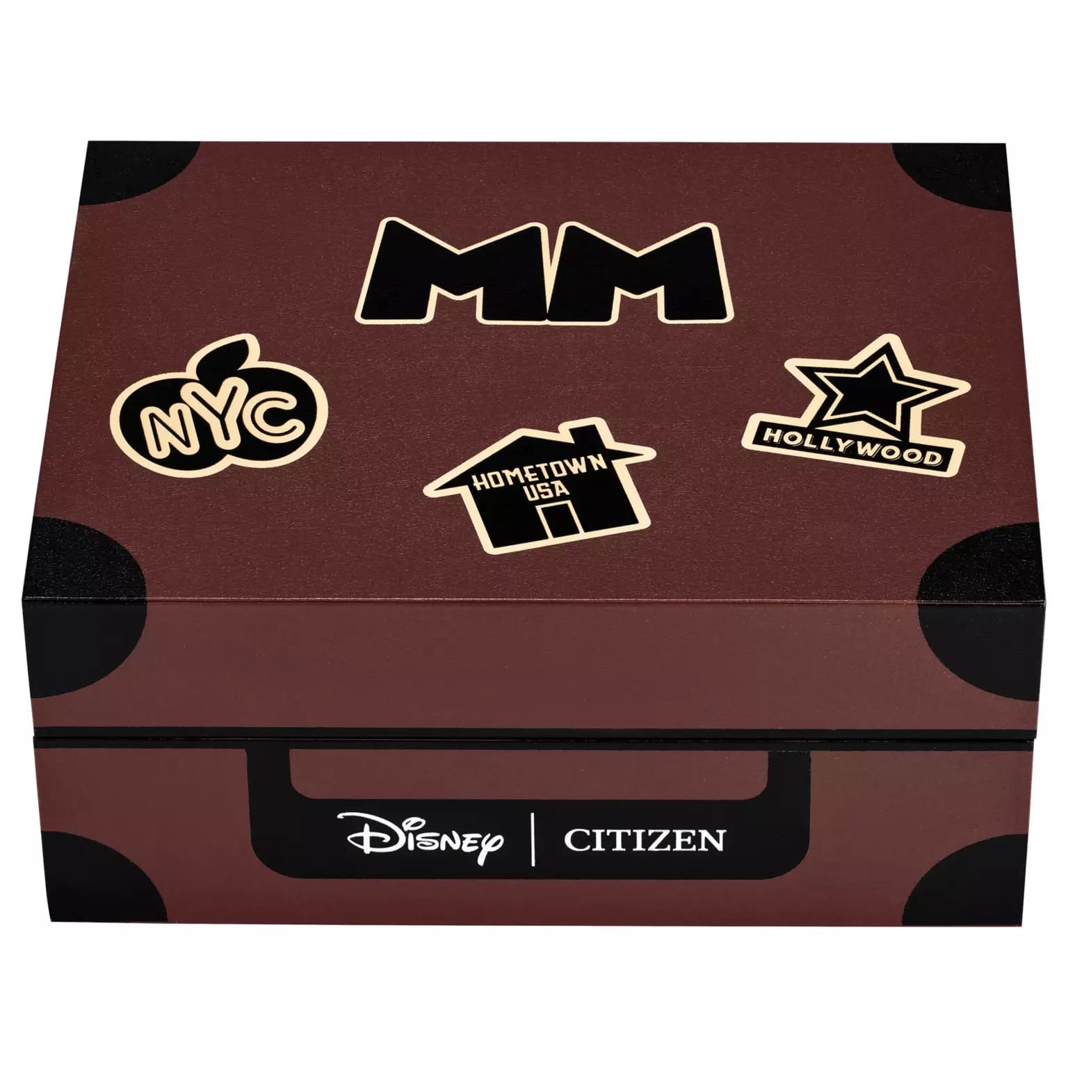 A brown Disney Citizen box decorated with black dots, Mickey Mouse stickers, and travel-themed labels