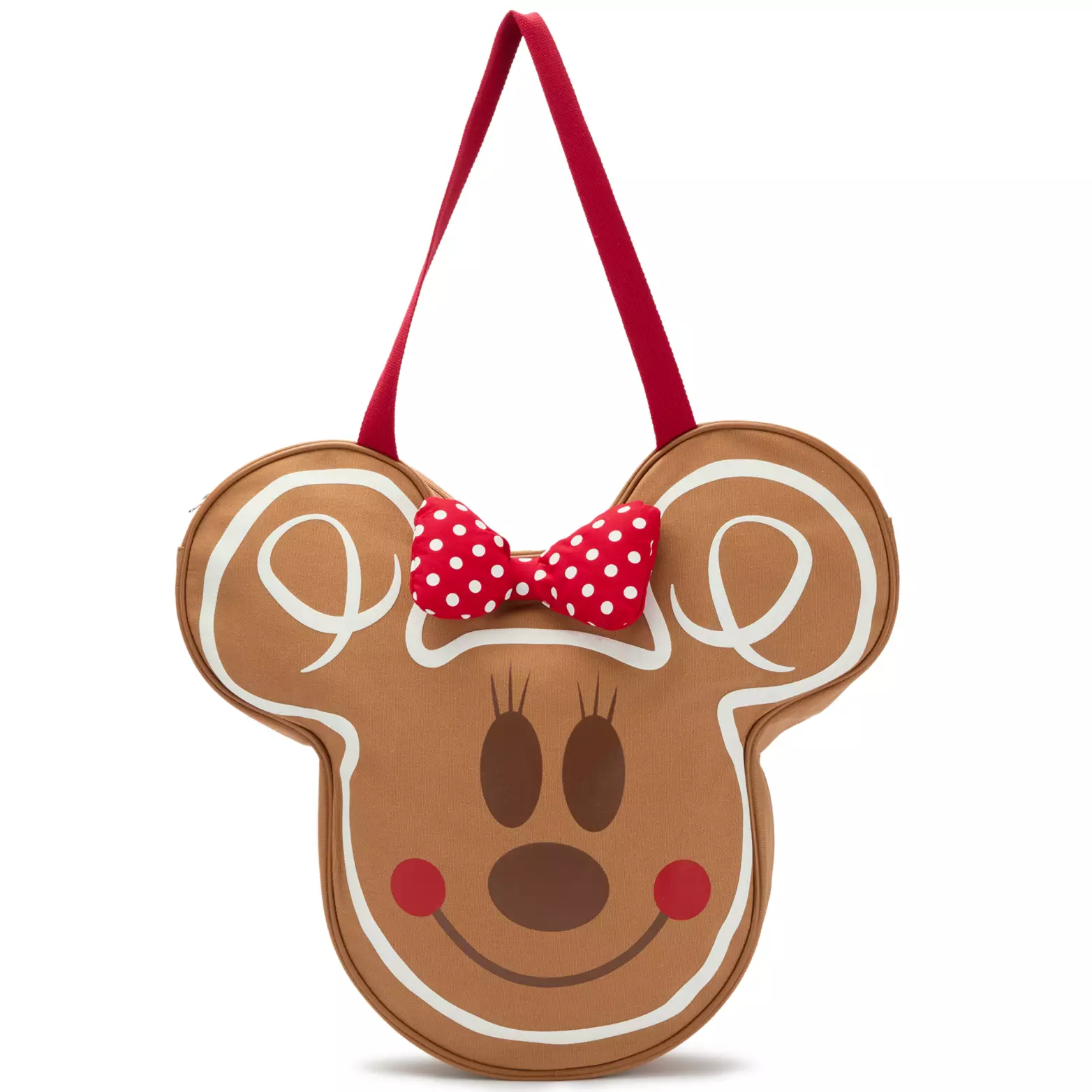 A gingerbread-shaped bag featuring Minnie Mouse details, a red polka dot bow, and a red strap, popular at Disney Parks.