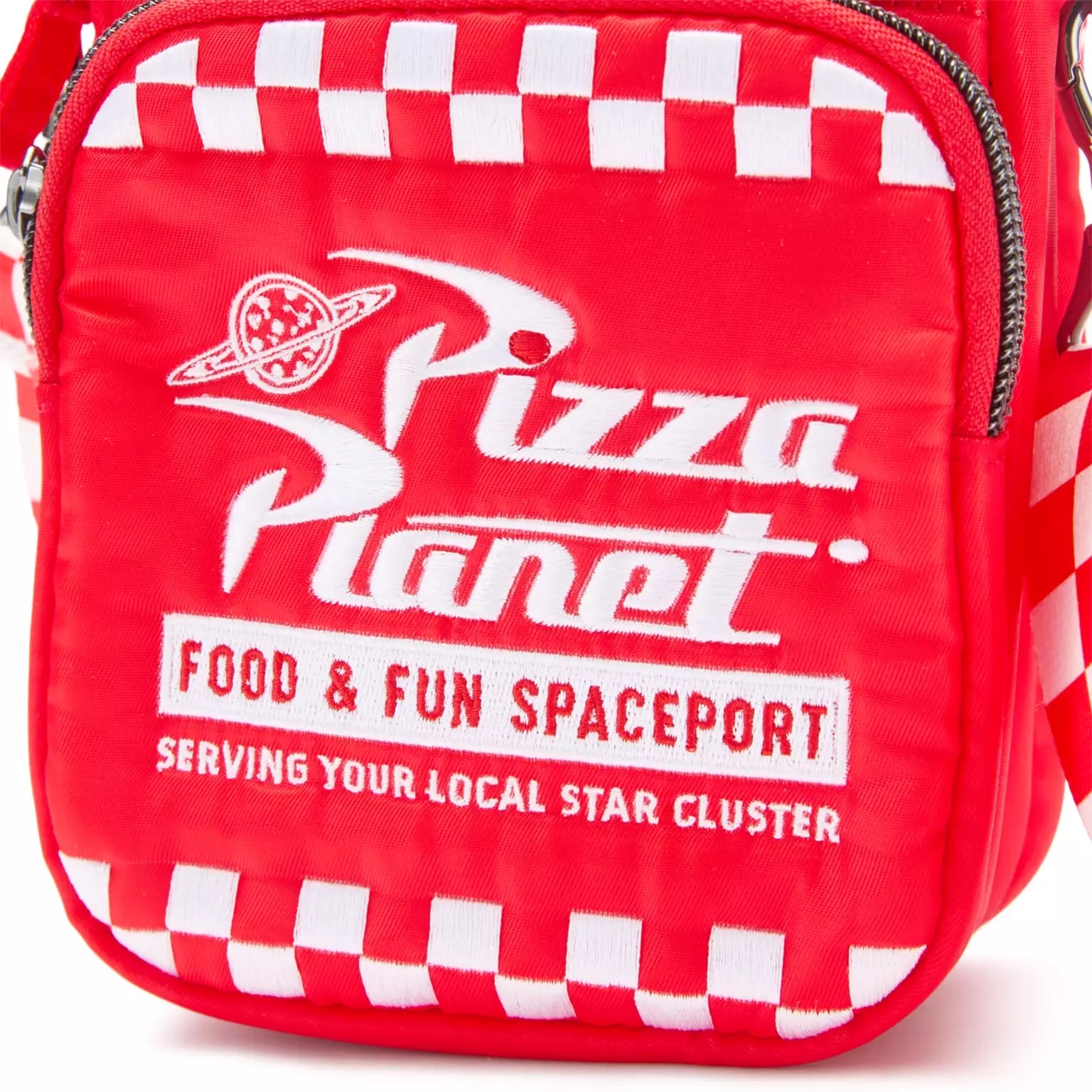 Red Pizza Planet crossbody bag with white checkered trim, channeling Toy Story vibes—perfect for a day at any Disney park.