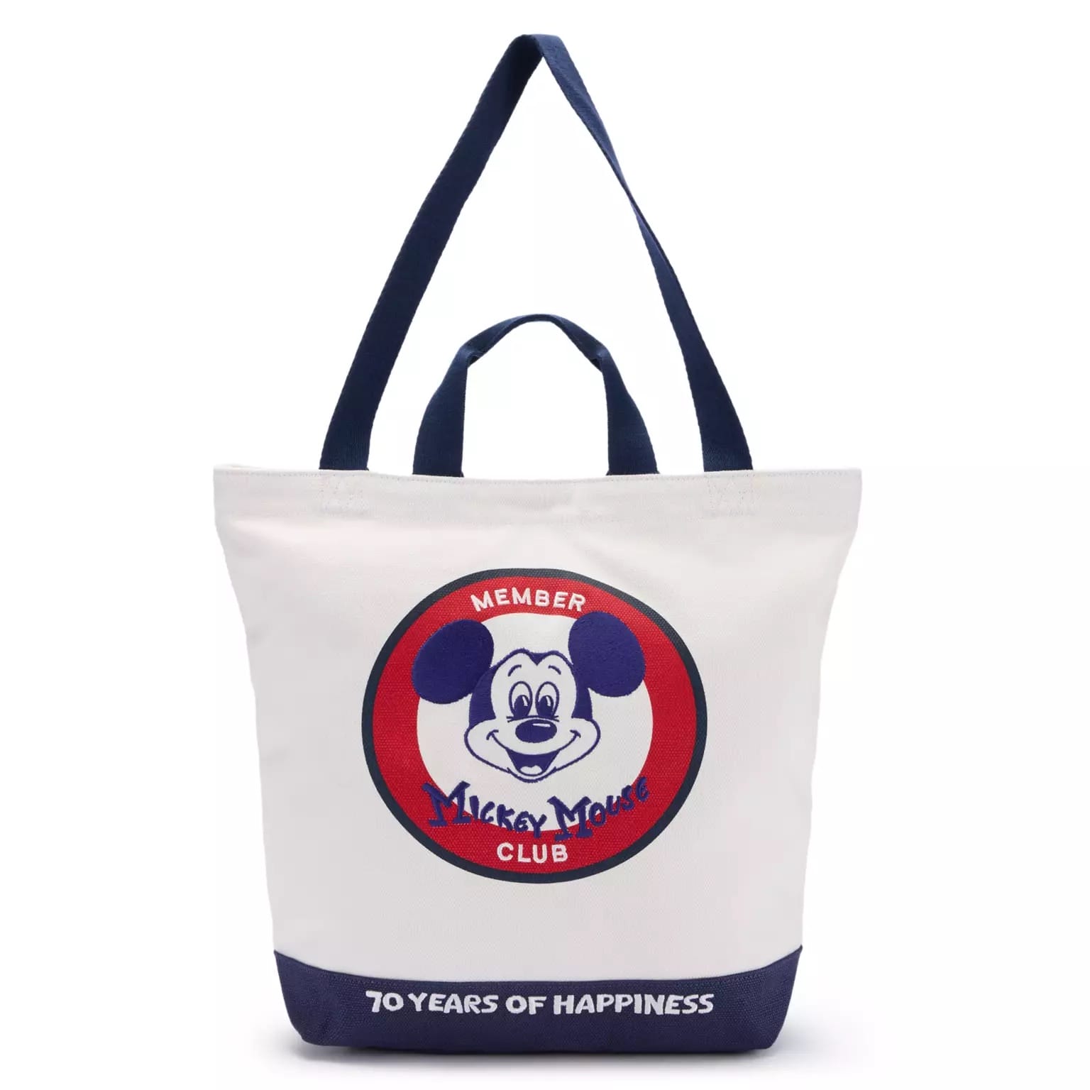 White tote bag with navy handles, Disney Store-Exclusive Mickey Mouse Club 70th Anniversary logo and "70 Years of Happiness" text.