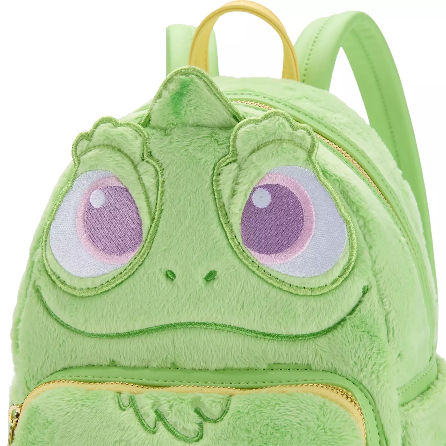 A pastel green mini backpack featuring a cartoon character, ideal for Disney park visits, and pairs nicely with Loungefly ears.