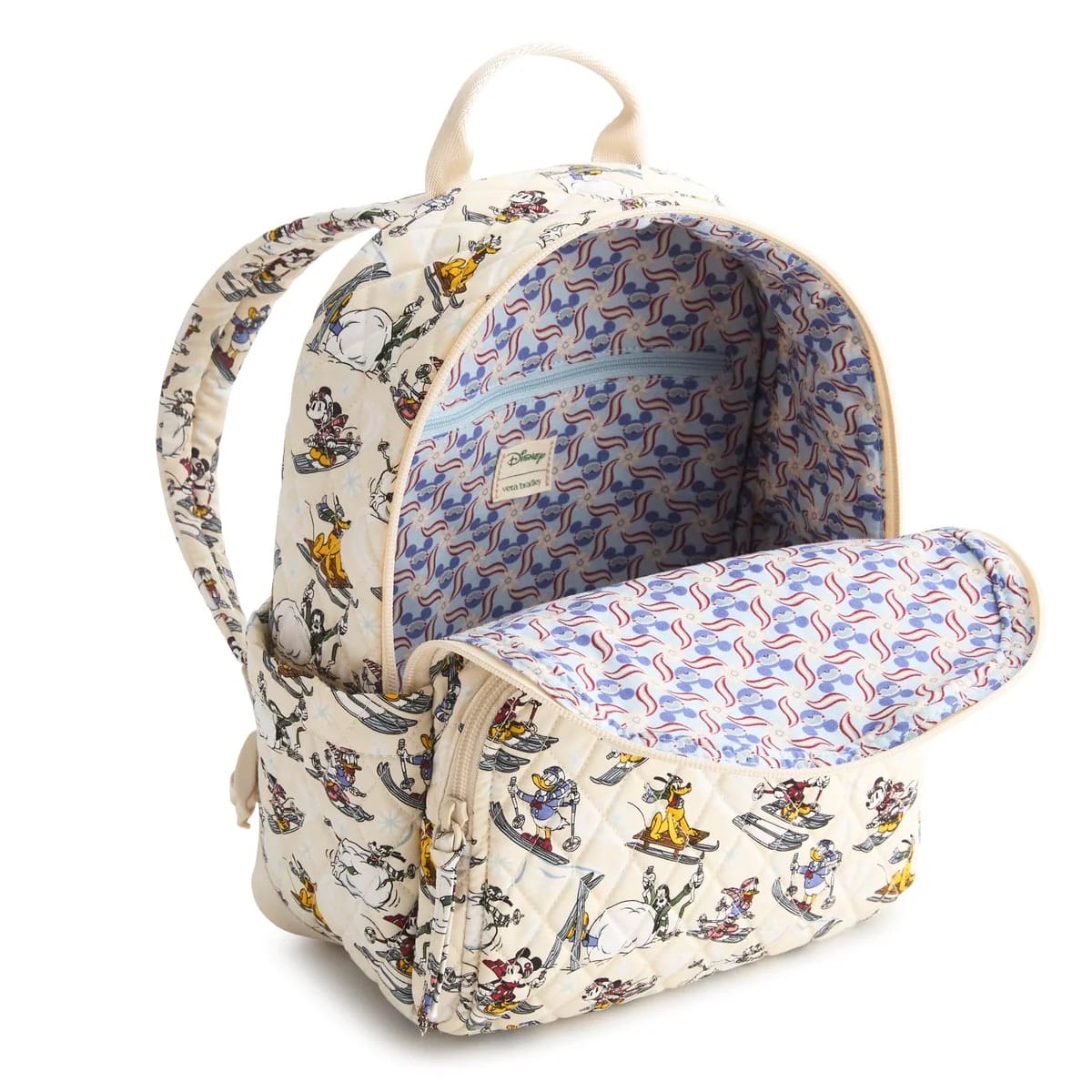 Cream backpack with Disney Mickey & Friends print, open to reveal blue and red inner lining reminiscent of Disneyland fun.