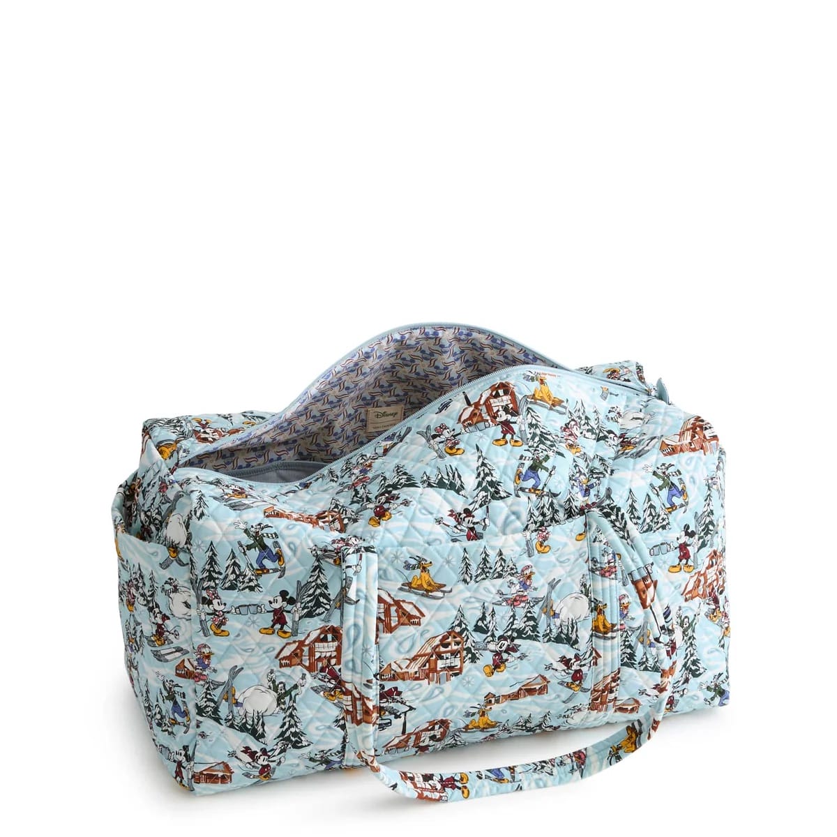 Quilted duffel bag from the Ski Weekend Collection with a winter village ski scene reminiscent of Disney park holiday decor, double handles.