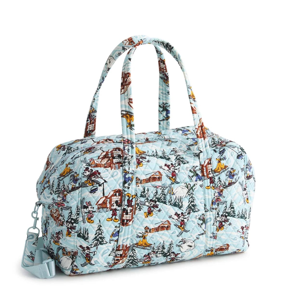 Light blue Vera Bradley duffel bag features Mickey & Friends holiday scenes, like those found at Disney Parks, with double handles and detachable strap.