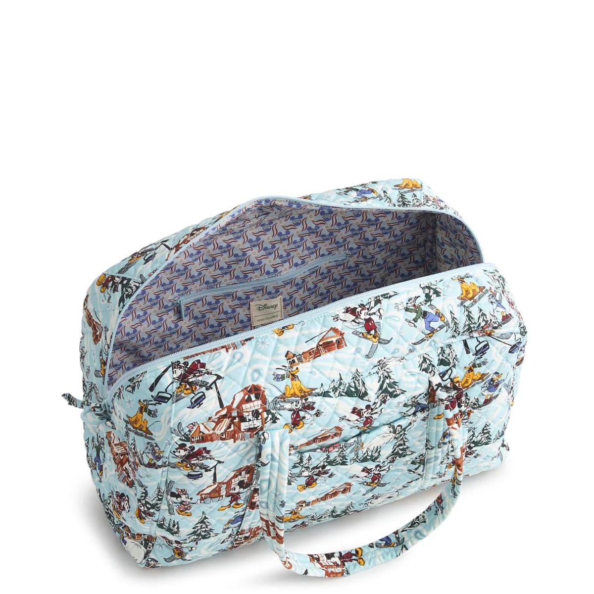 A quilted duffel bag with winter-themed Mickey & Friends prints, open to reveal a roomy, patterned interior and sturdy handles—perfect for carrying souvenirs from any Disney park around the world.