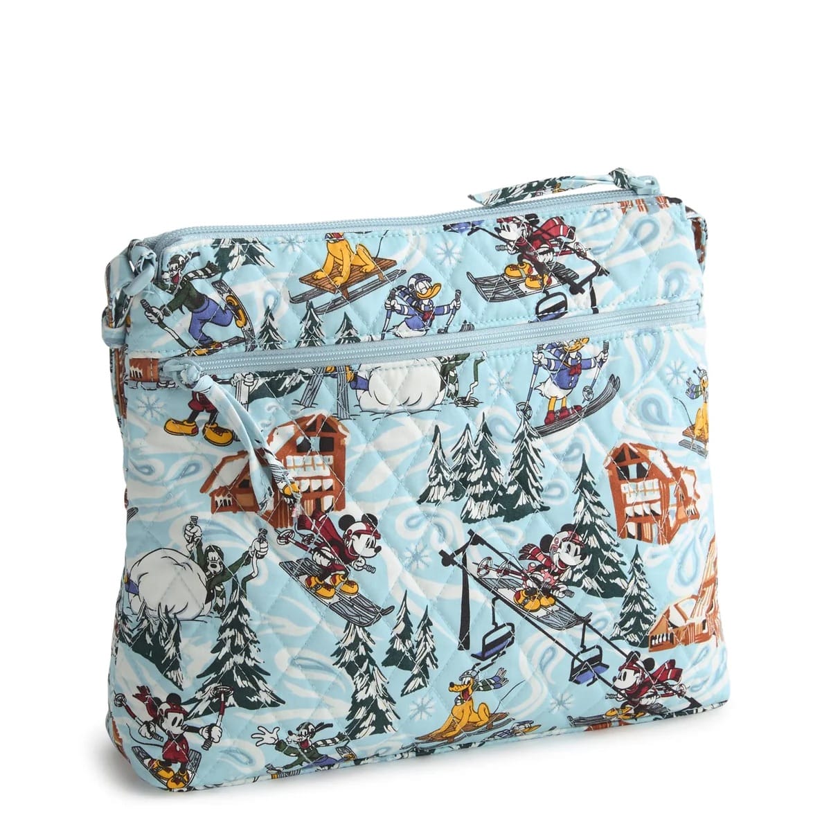 Light blue quilted Vera Bradley bag showing Disney winter sports with Mickey & Friends, snowy trees, and ski lifts—no castles shown.