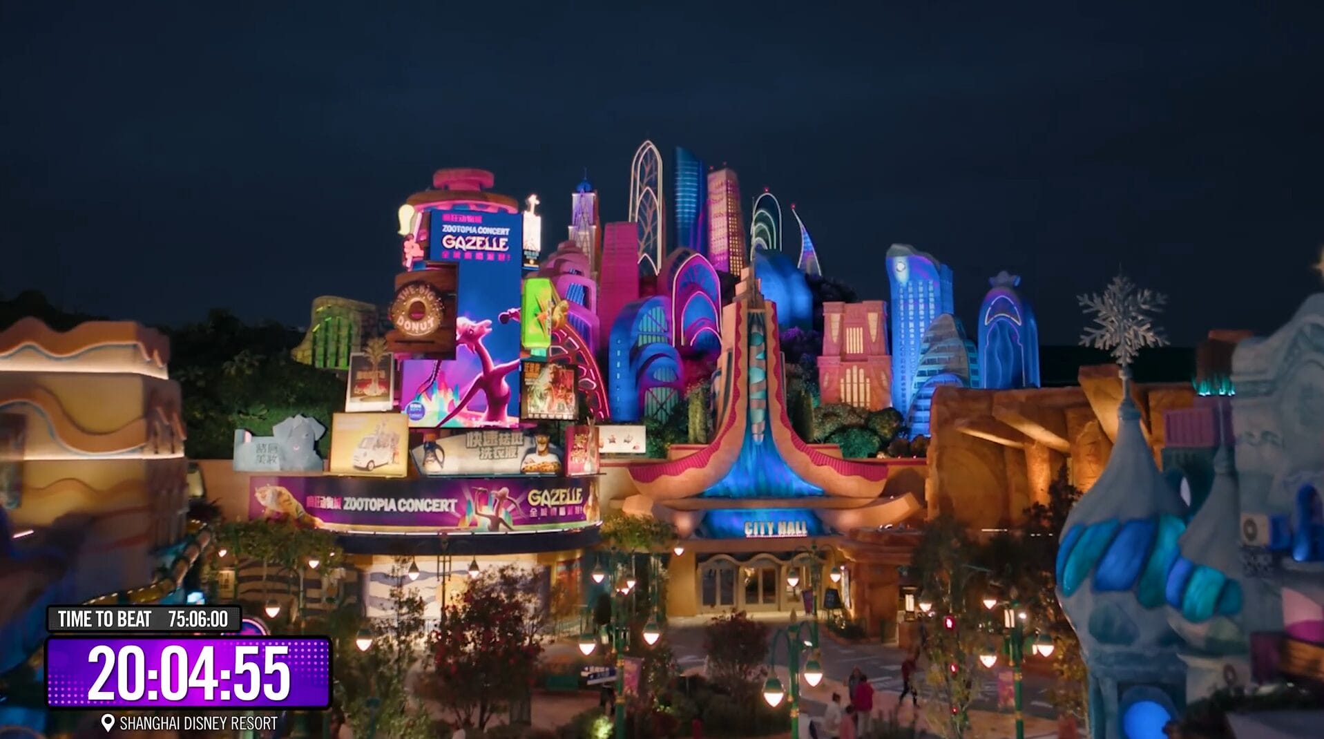 Colorfully lit Disney Park buildings at night, with a VIDEO timer overlay in the lower left corner reading "20:04.55".