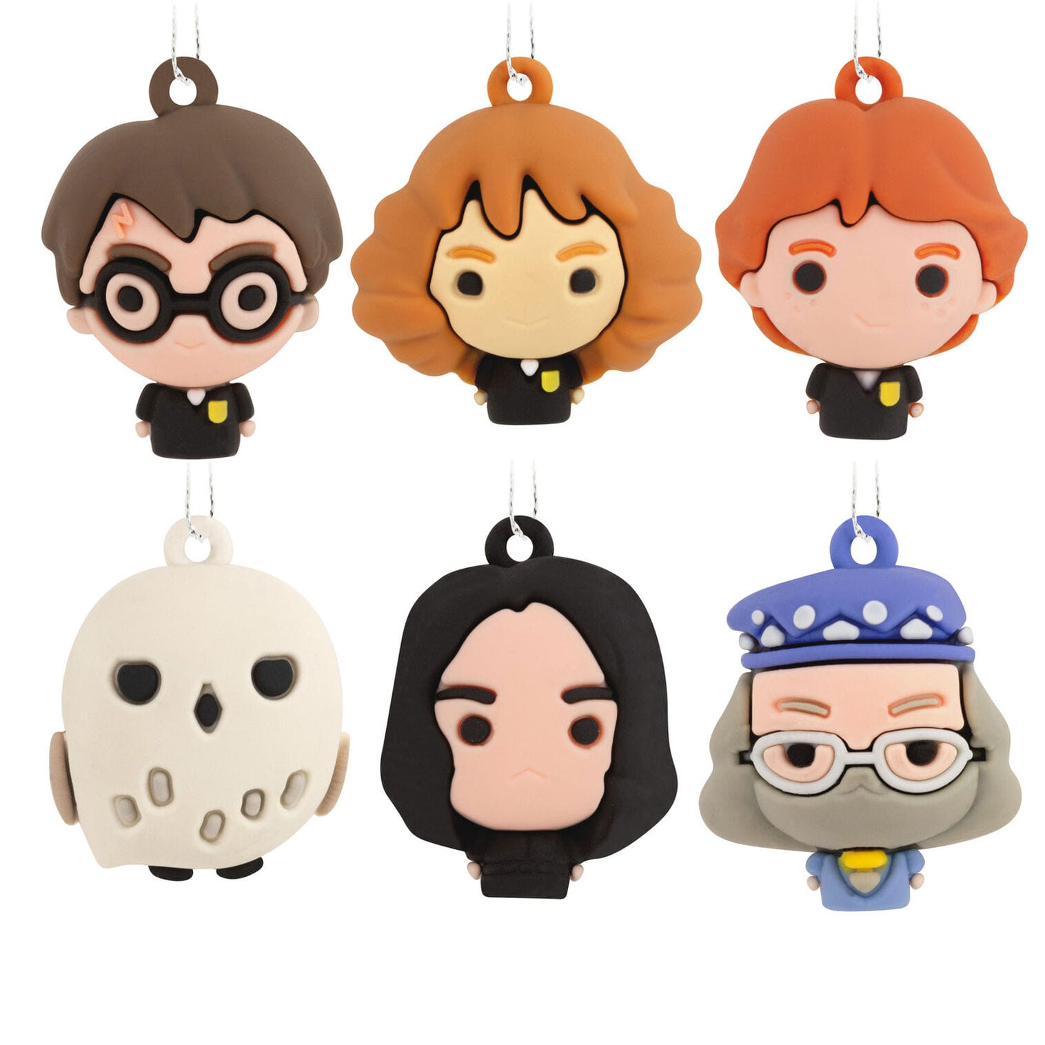 Six whimsical Hallmark keychains of Harry Potter characters, styled like park souvenirs, displayed on a white background.