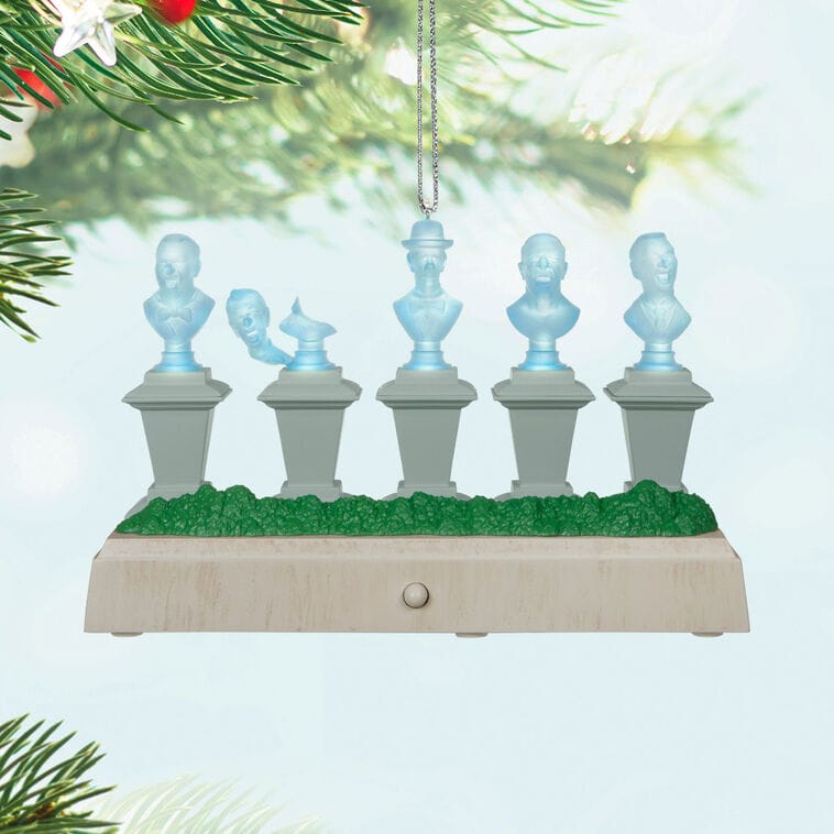 Hallmark Disney Keepsake Ornament of five blue ghost busts singing, inspired by Haunted Mansion ride at Disney theme parks worldwide.