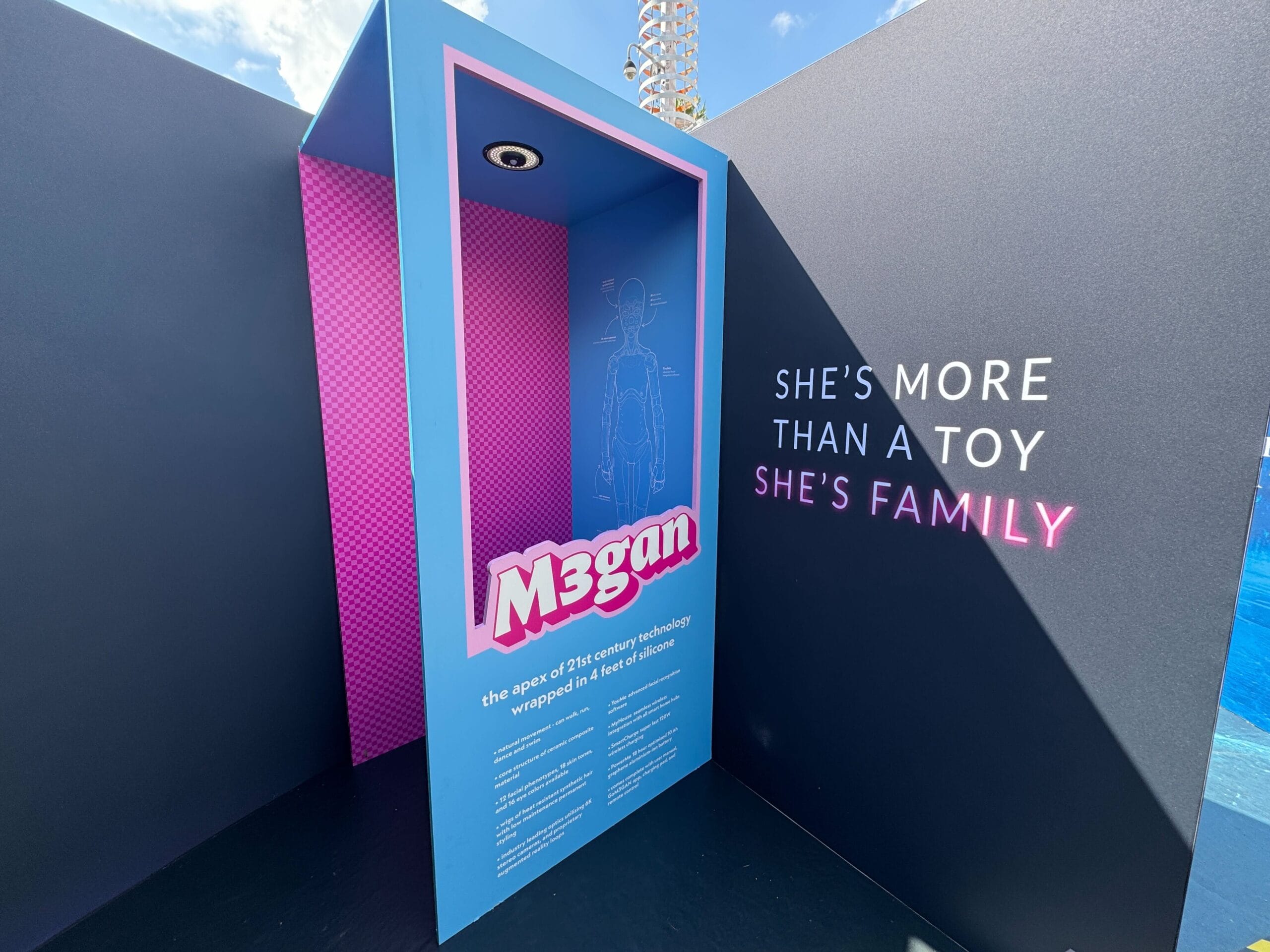 A life-size blue and pink M3GAN doll box display at Universal CityWalk—perfect for Blumhouse fans and photo ops.