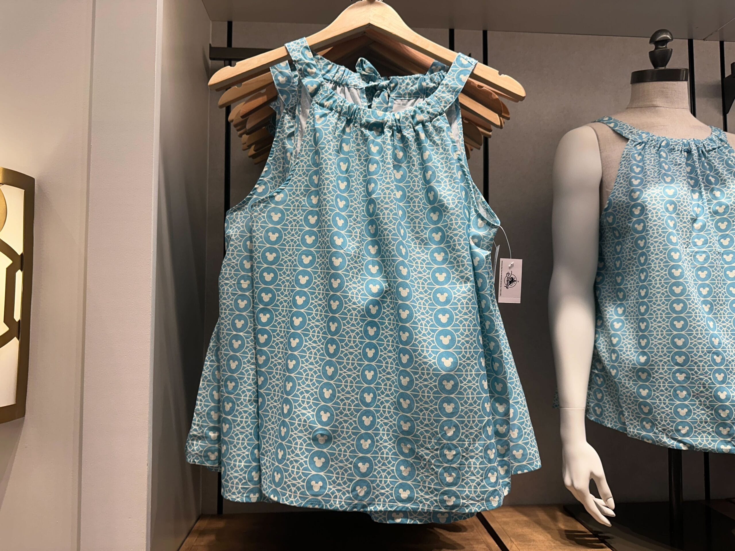 Sleeveless blue top with white heart patterns, a magical Disney's Riviera Resort item found at Walt Disney World, not castle-themed.
