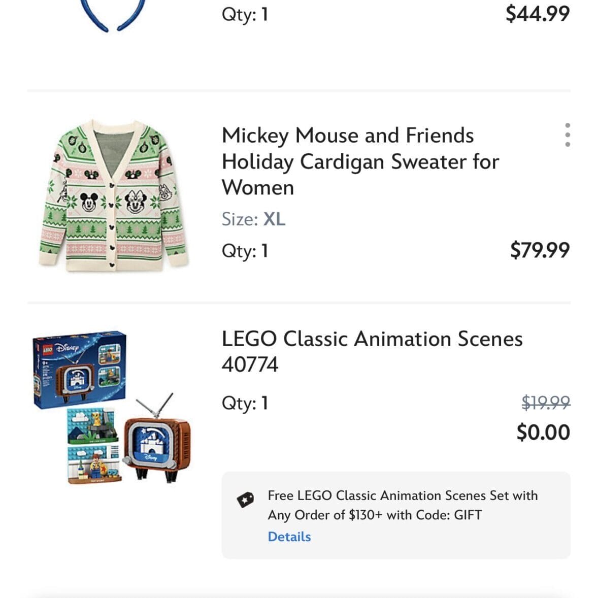 Disney Store cart: Free Donald Duck ears, holiday cardigan, LEGO Classic Animation Scenes, $187.17; no park castle pictured.