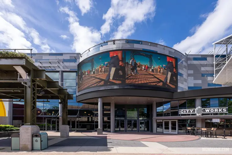 Digital signage for the upcoming Level99 venue at Disney Springs next to City Works Eatery & Pour House.