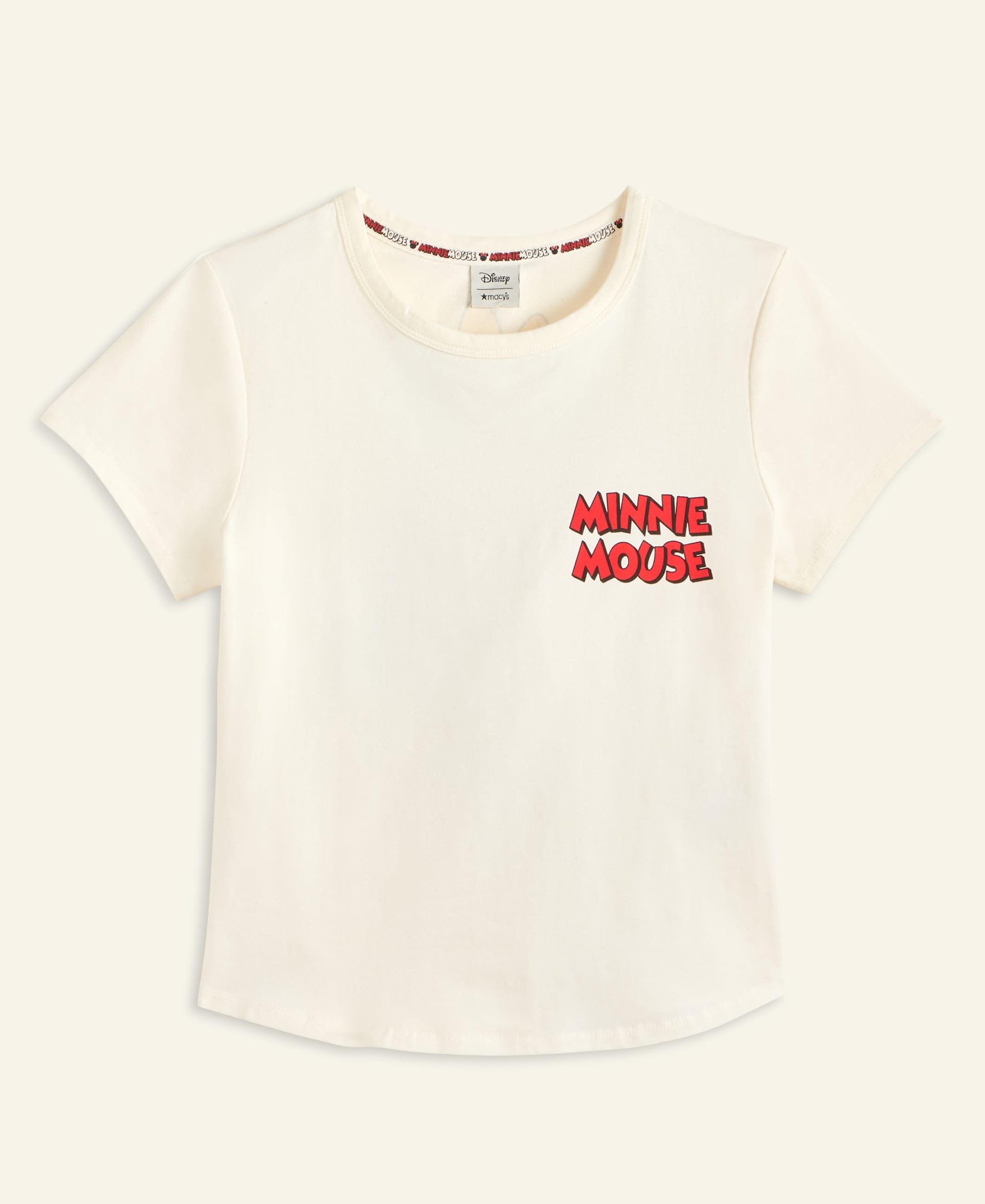Cream-colored Disney tee with "Minnie Mouse" in bold red on the left chest, reminiscent of playful park apparel at Disney resorts.