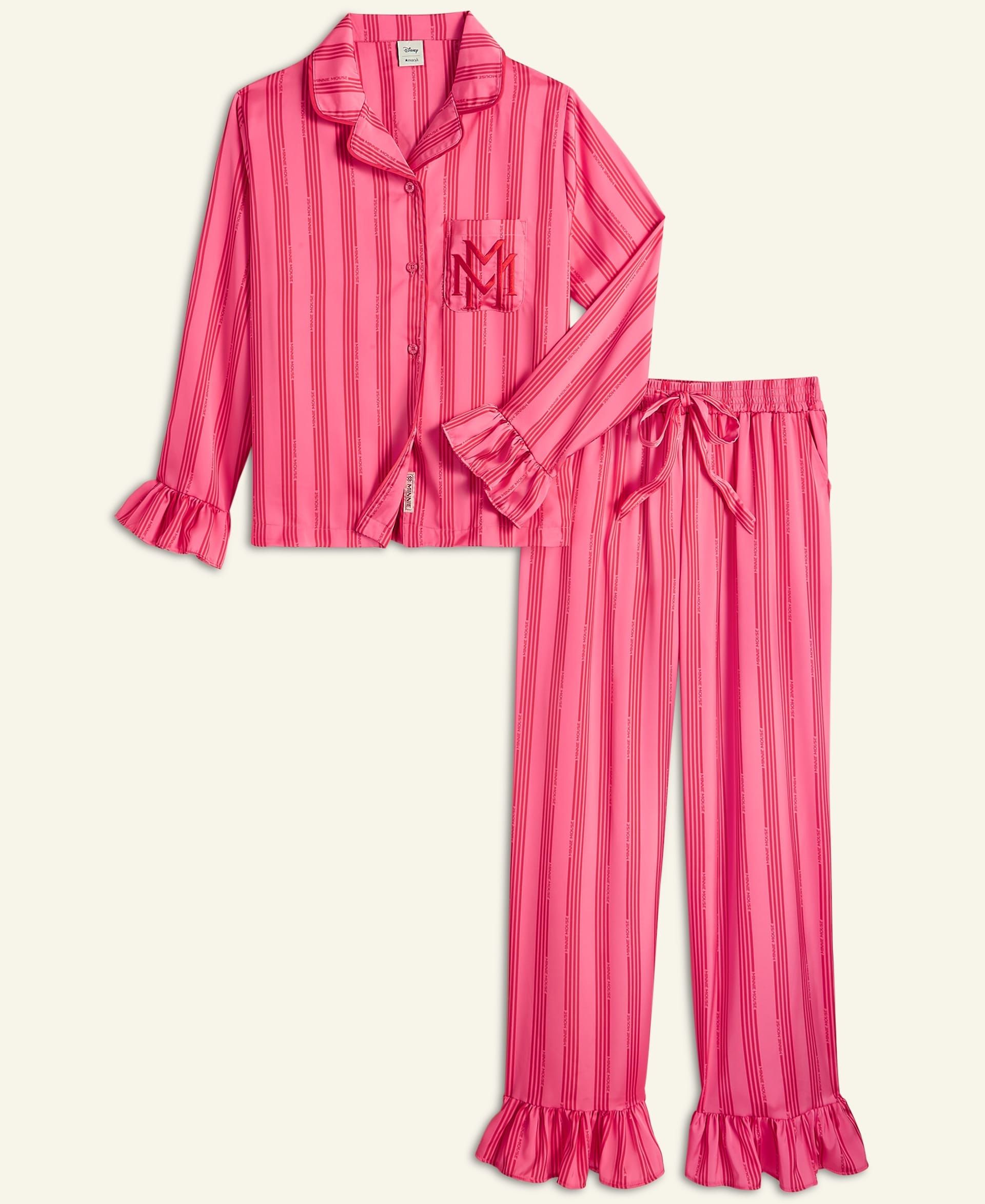 From Macy’s 2025 Holiday Collection: Pink striped pajamas with ruffled cuffs, reminiscent of cozy Disney resort sleepwear.