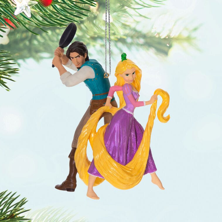 Hallmark Keepsake Ornament: Rapunzel & Flynn Rider from Tangled, swirling hair; a magical touch like Disney Park castle décor.