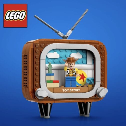 LEGO TV set shows Toy Story’s Woody with the Pixar star ball, evoking classic Disney Parks magic—no castle in this scene.