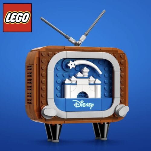 LEGO model of a vintage TV displays a white castle resembling Disneyland’s castle, LEGO logo in the corner, nod to Disney parks.