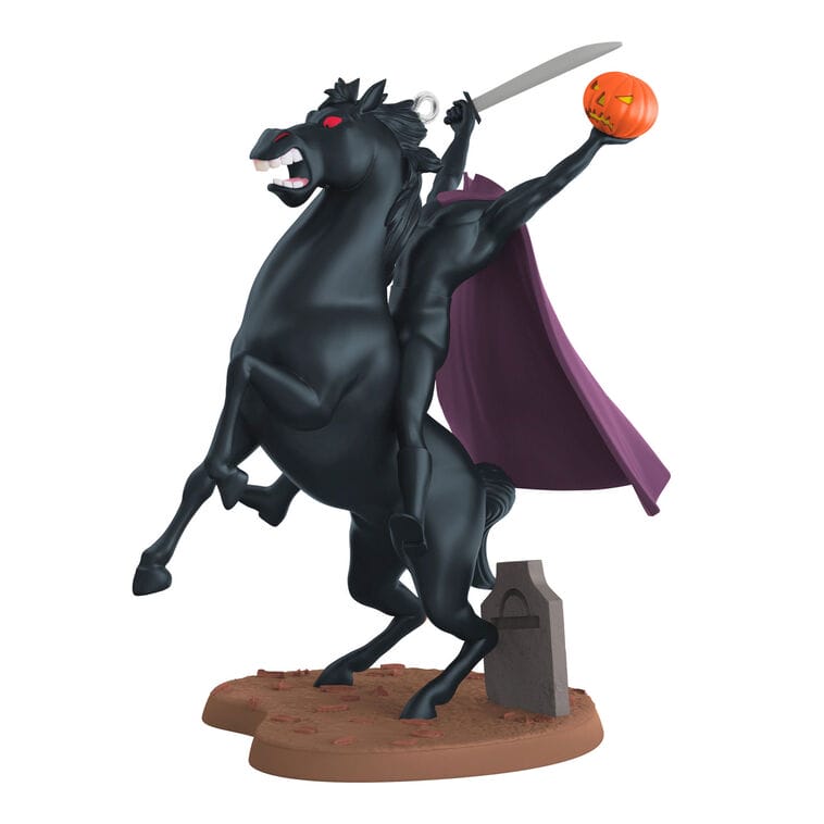 Hallmark Headless Horseman figurine on a rearing black horse, sword raised, pumpkin in hand, purple cape—no Disney castle present.