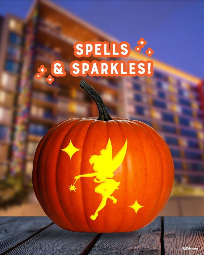A glowing Tinker Bell pumpkin stencil shines for Halloween at a Disney park, "Spells & Sparkles!" above like castle fireworks.