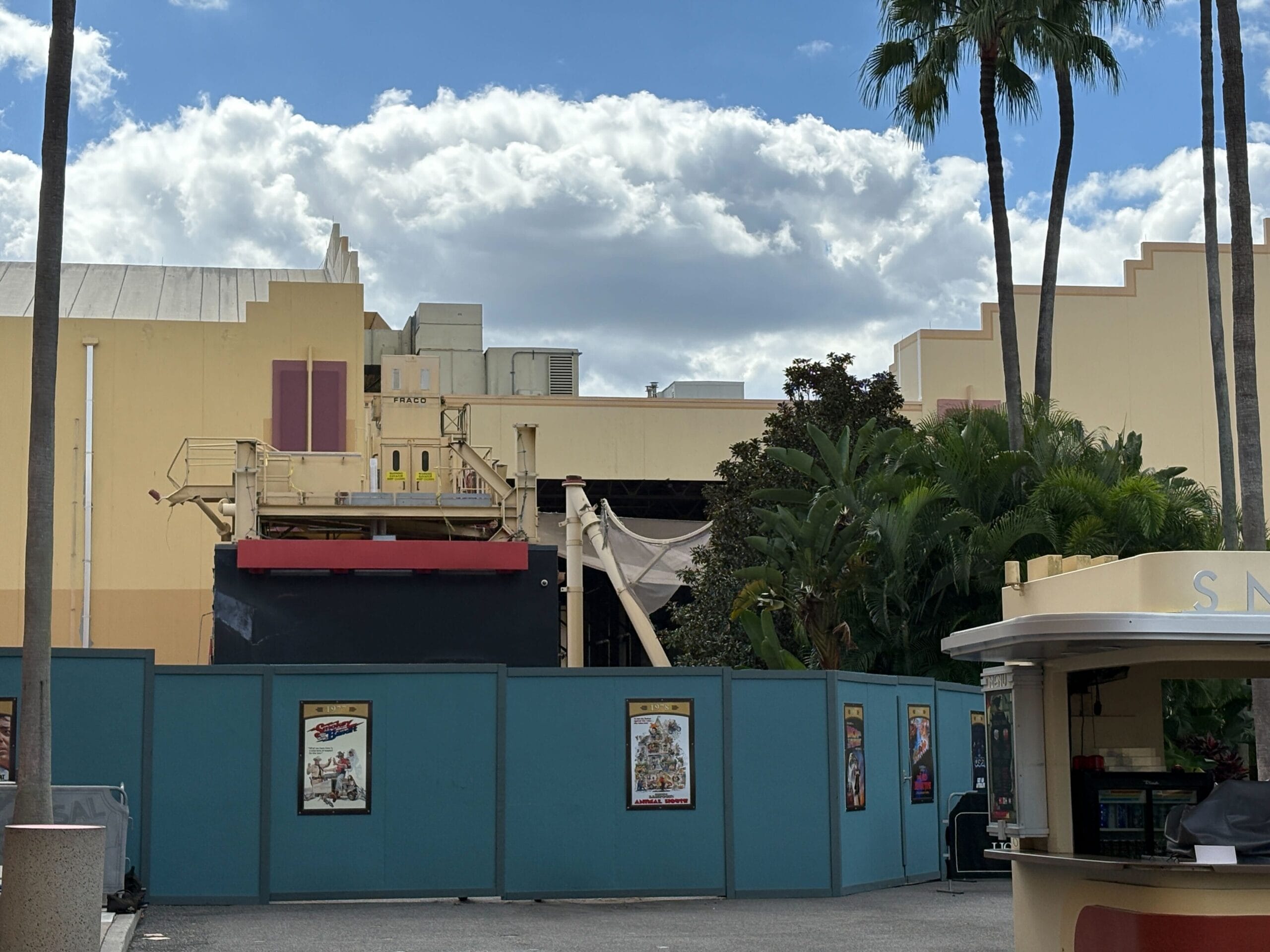 Construction site behind teal barriers at Universal Studios Florida.
