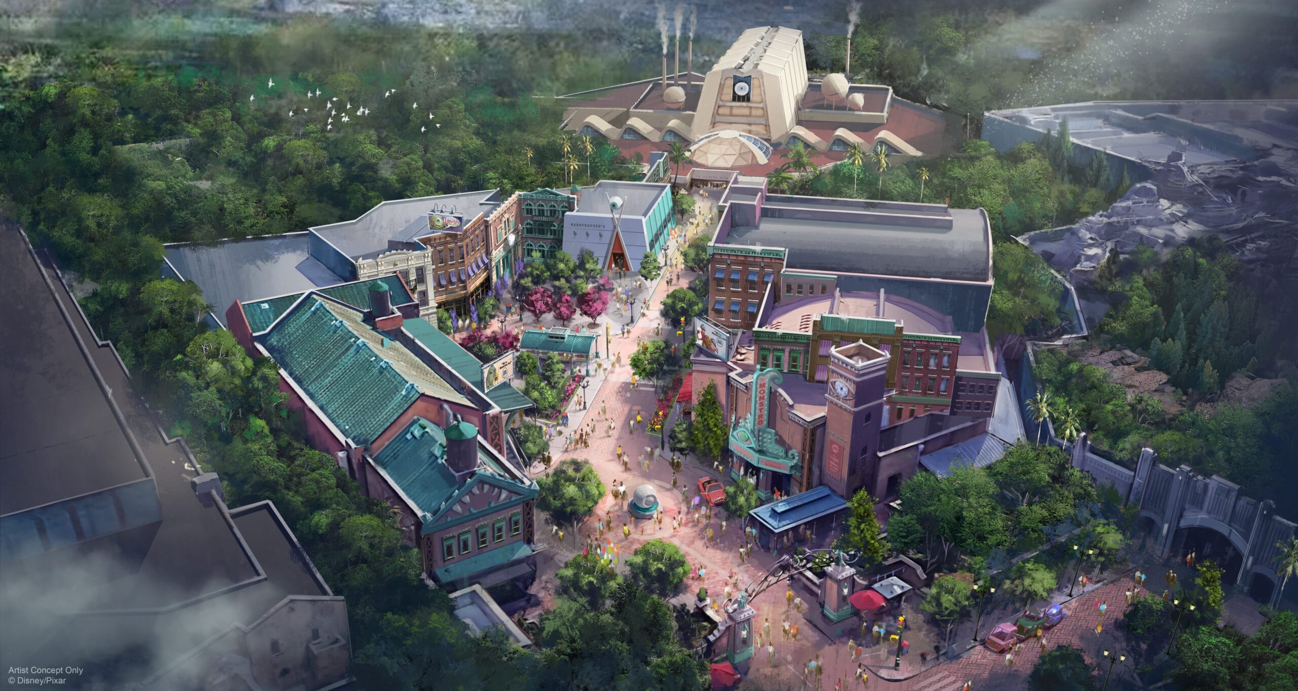Aerial view of Epic Universe city park with vibrant buildings, lush greenery, winding paths, and a central fountain—no Disney castle.