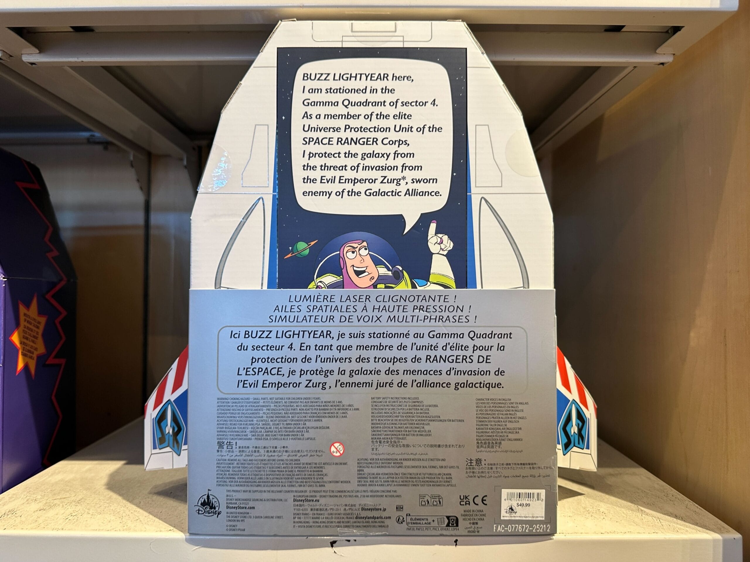 Box back features Buzz Lightyear art, character info, and Toy Story 30th Anniversary notes in several languages—classic Disney style.