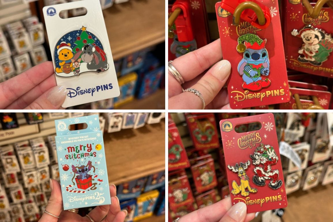 Four Disney Parks Christmas pins, with Stitch, Pooh, and festive motifs, displayed in a holiday store; no castles shown here.
