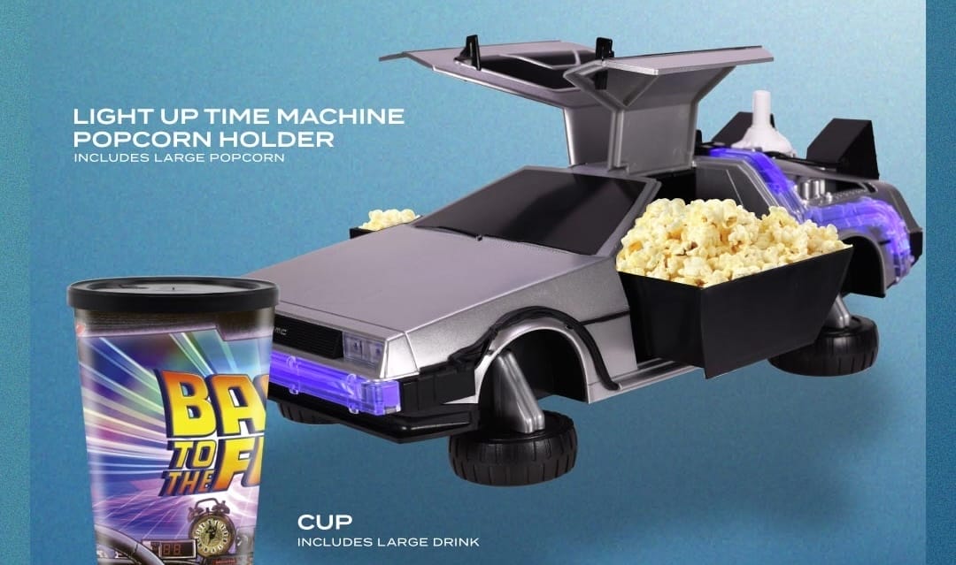 A DeLorean-shaped popcorn holder and retro drink cup—fun park snacks, but no Cinderella Castle in sight for this movie night.