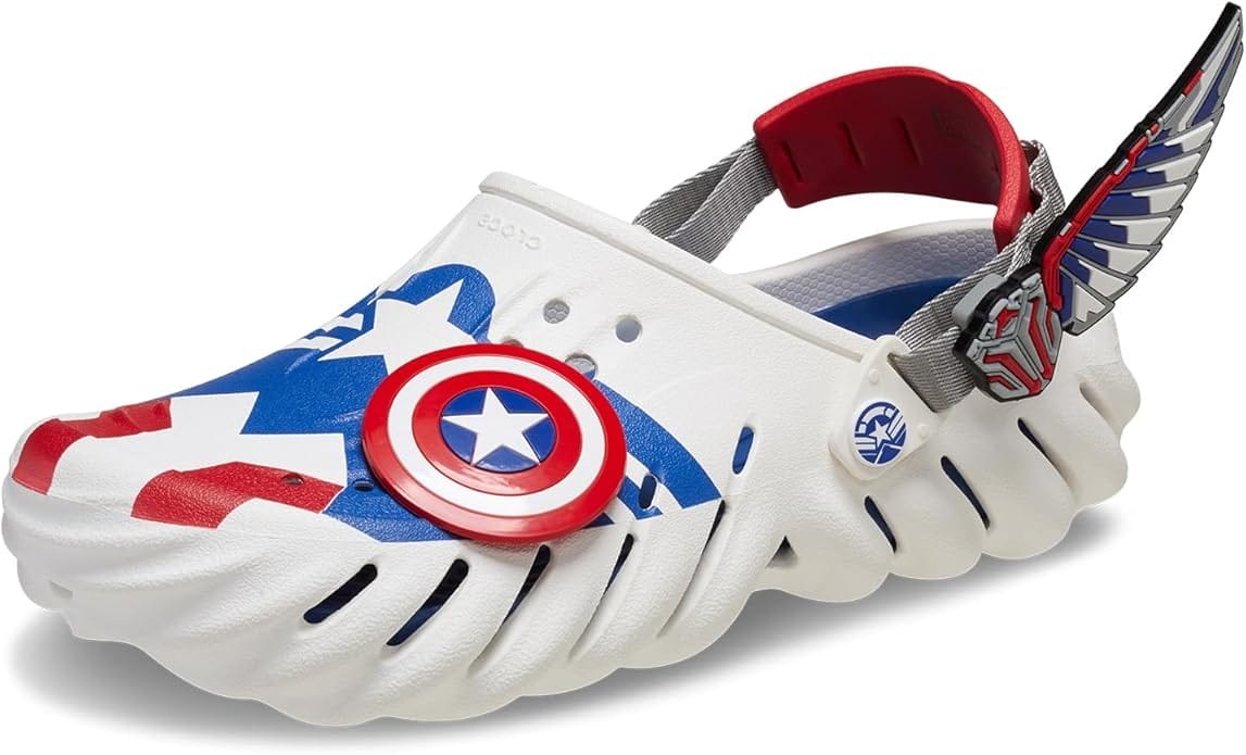 White Crocs clog inspired by Sam Wilson's Captain America featuring a patriotic red, white, and blue graphic, a star shield charm and back wing attachments.
