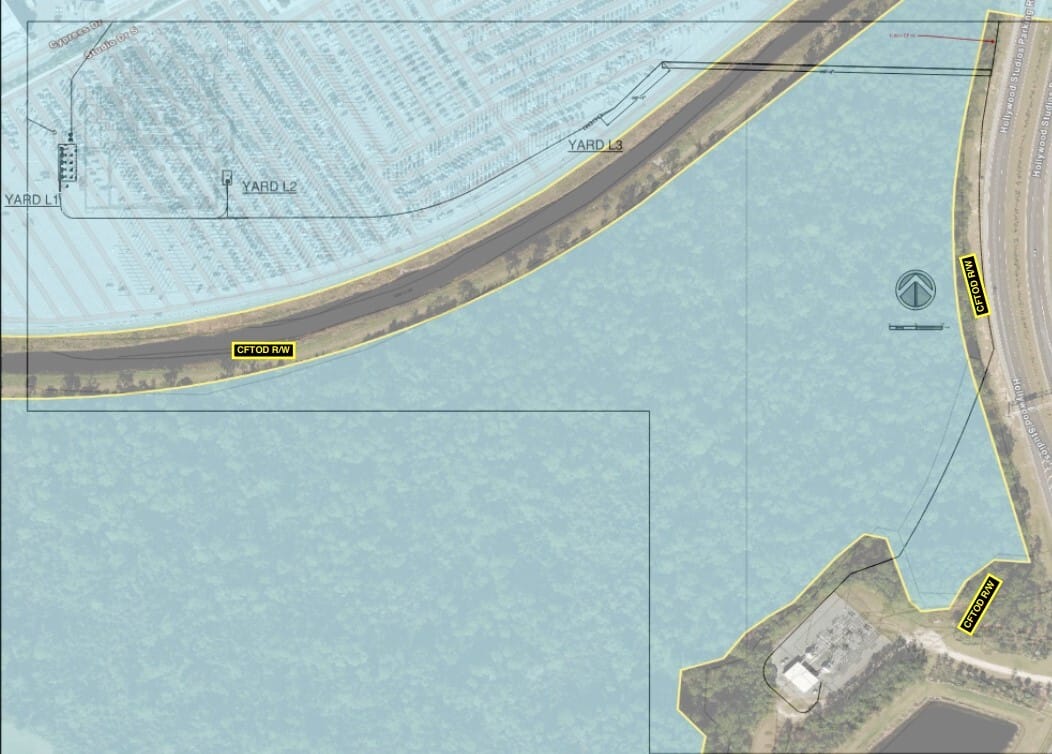 Map shows CF700 NW road, nearby areas, woods, and a riverside building within CFTOD, near Walt Disney World property boundaries.
