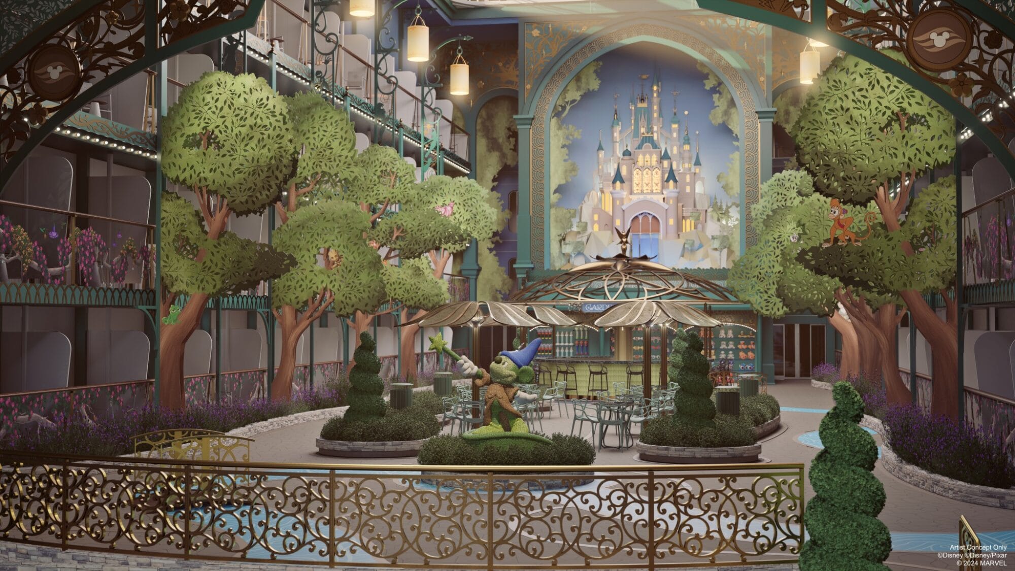 Courtyard with lush trees, a sorcerer statue, tables, and a mural of a castle resembling Disneyland’s iconic Sleeping Beauty Castle.