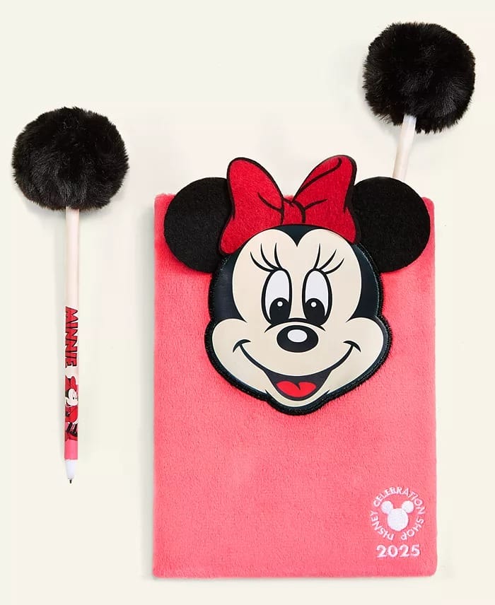 A pink plush Minnie Mouse notebook from the Disney 2025 Holiday Collection, with two fluffy pens, like gifts at Disney parks.