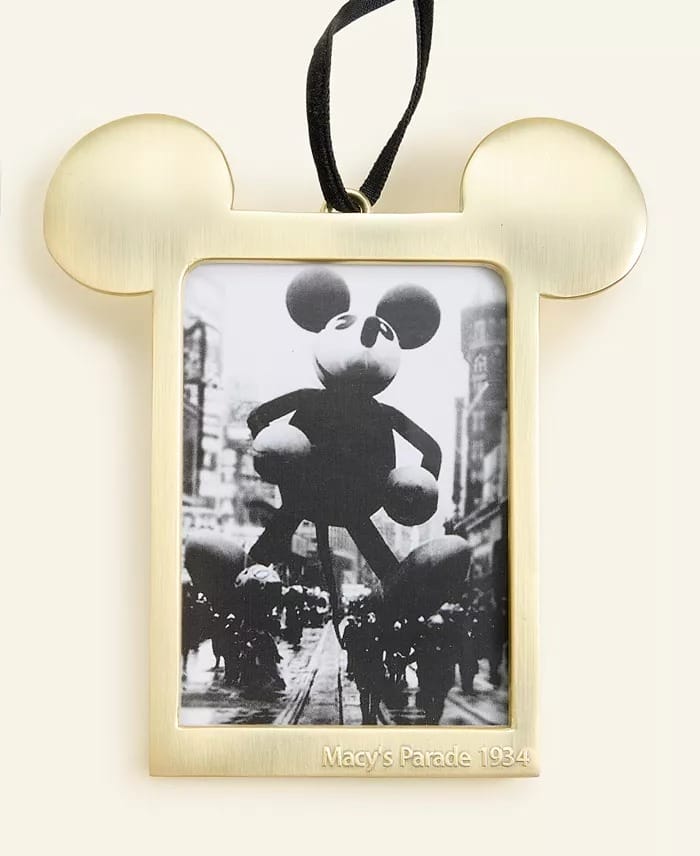 Gold Mickey Mouse frame holds a 1934 Macy’s Parade photo, from Disney’s 2025 Holiday Collection, no park castles depicted here.