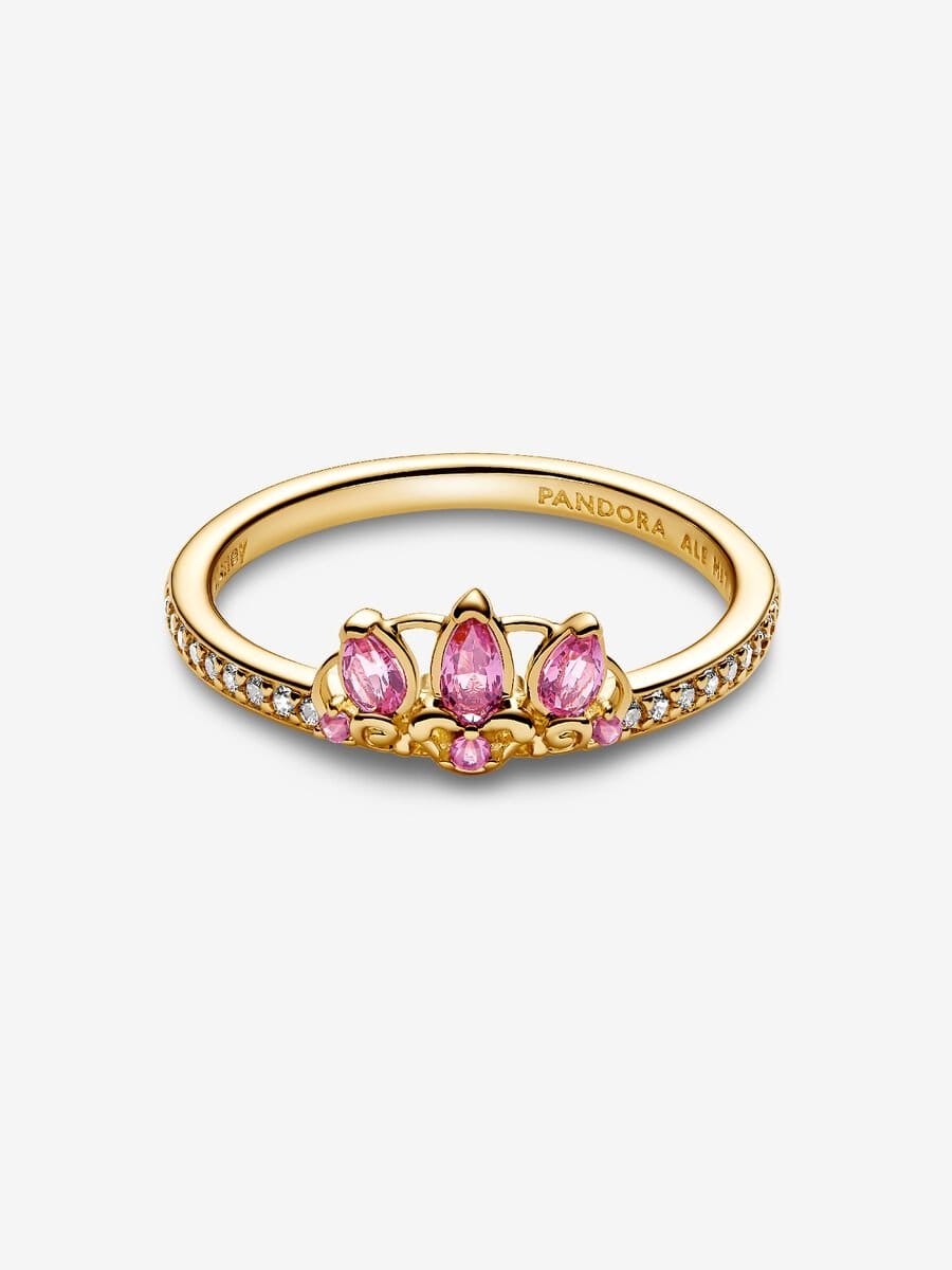 Gold ring featuring a Disney Princess-inspired crown, pink gems, and clear stones like sparkling castle turrets in Disneyland parks.