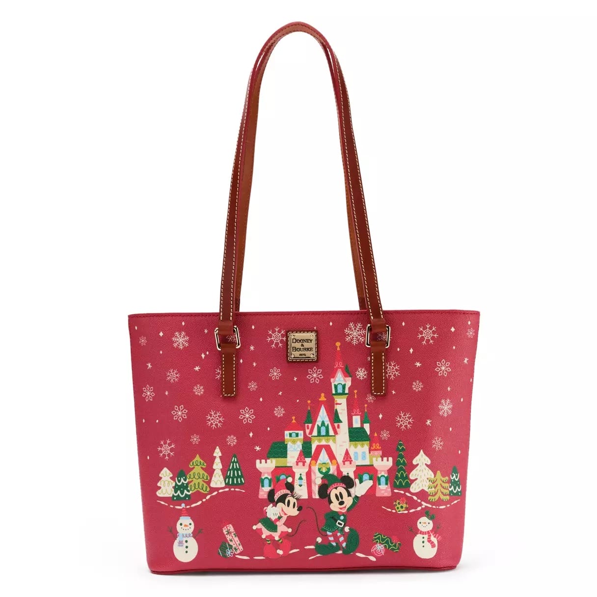 Pink tote bag with Mickey & Minnie Mouse, snowmen, Christmas trees, and a castle resembling Disneyland’s festive holiday decor.
