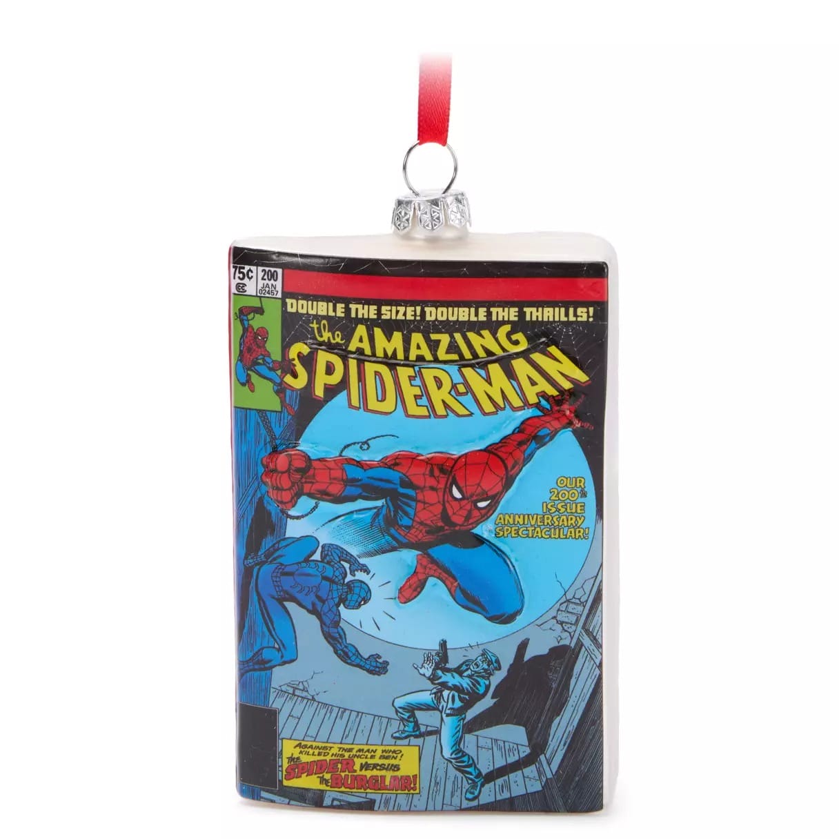 A Spider-Man comic book cover ornament with Spider-Man swinging above a villain, hanging by a red ribbon.