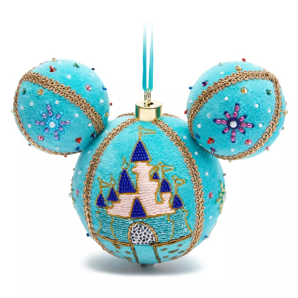 Blue Mickey Mouse-shaped ornament with a castle design, gold trim, and colorful bead decorations, hanging by a ribbon.