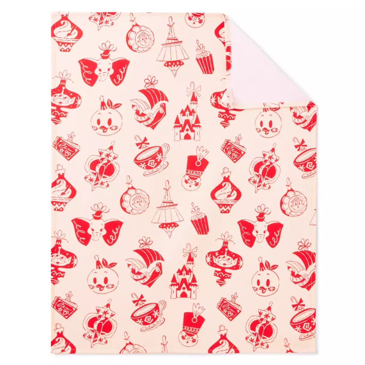 Pink blanket with red and white whimsical holiday-themed Disney icons and characters printed all over.