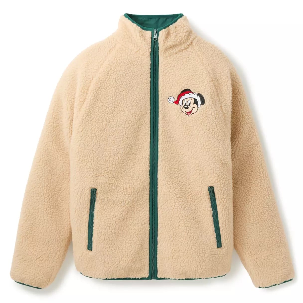 Beige sherpa zip-up jacket with green trim and a Mickey Mouse with Santa hat patch on the left chest.