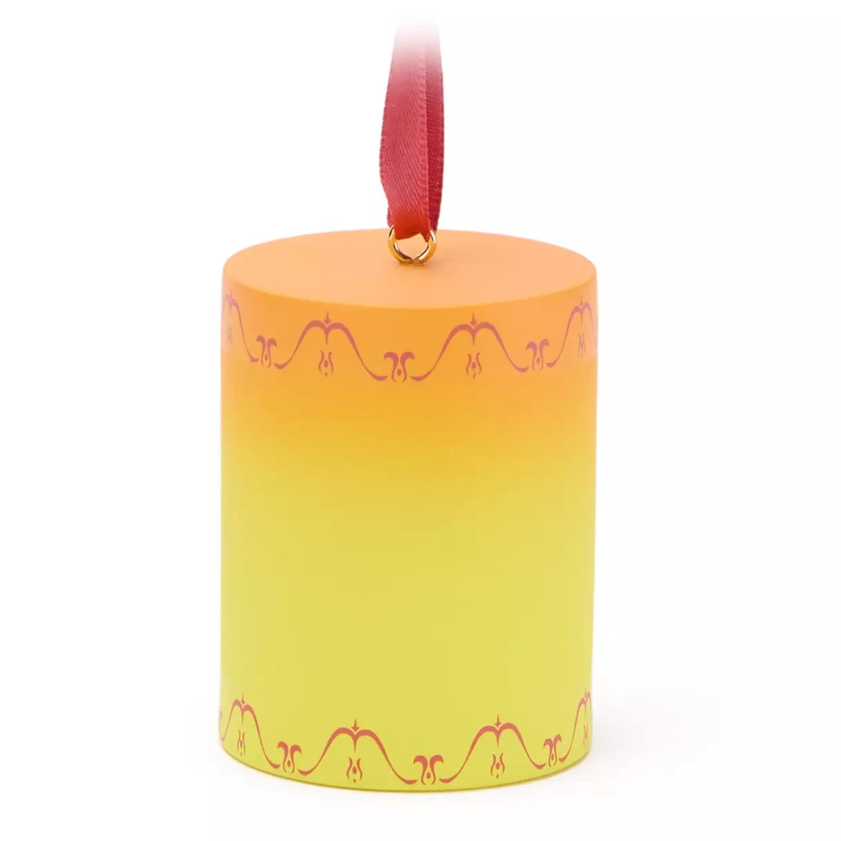 A cylindrical ornament with a yellow-to-orange gradient and red patterns, hanging from a red ribbon.