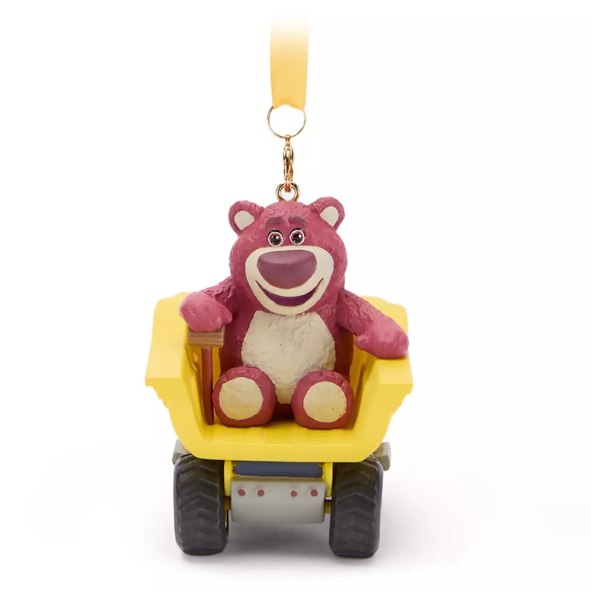 A Lotso bear ornament sits in a yellow toy dump truck, attached to a gold keychain with a yellow ribbon.