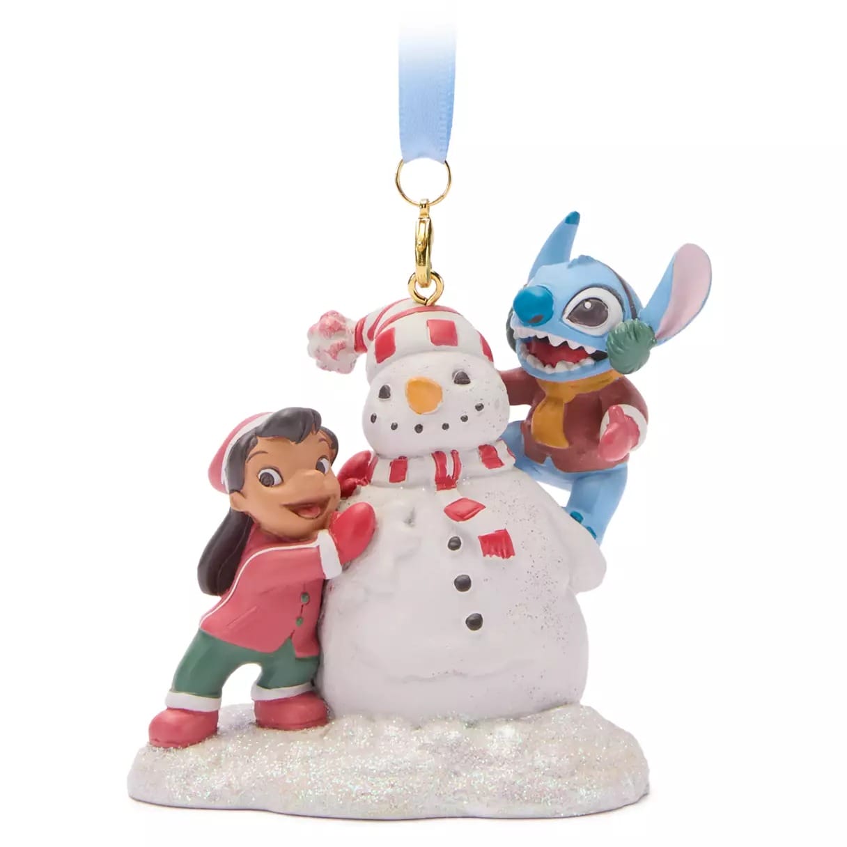 Lilo and Stitch decorate a snowman ornament, both wearing winter clothes and smiling joyfully.