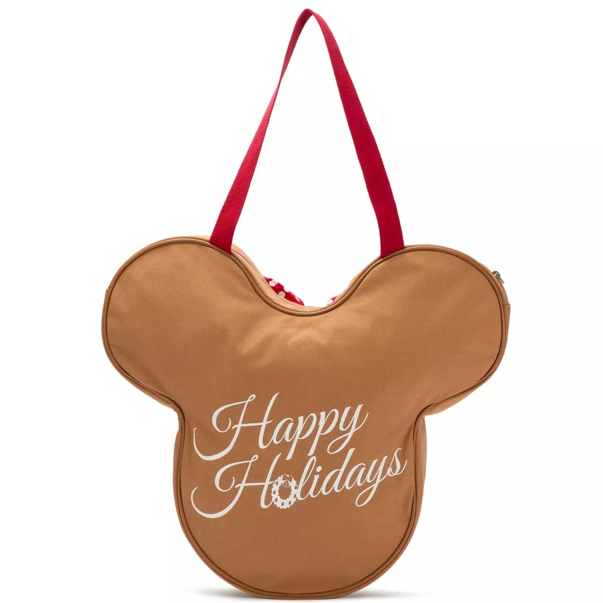 Brown Mickey Mouse-shaped bag with red straps and white "Happy Holidays" text, similar to festive merch seen at Disney Parks worldwide.