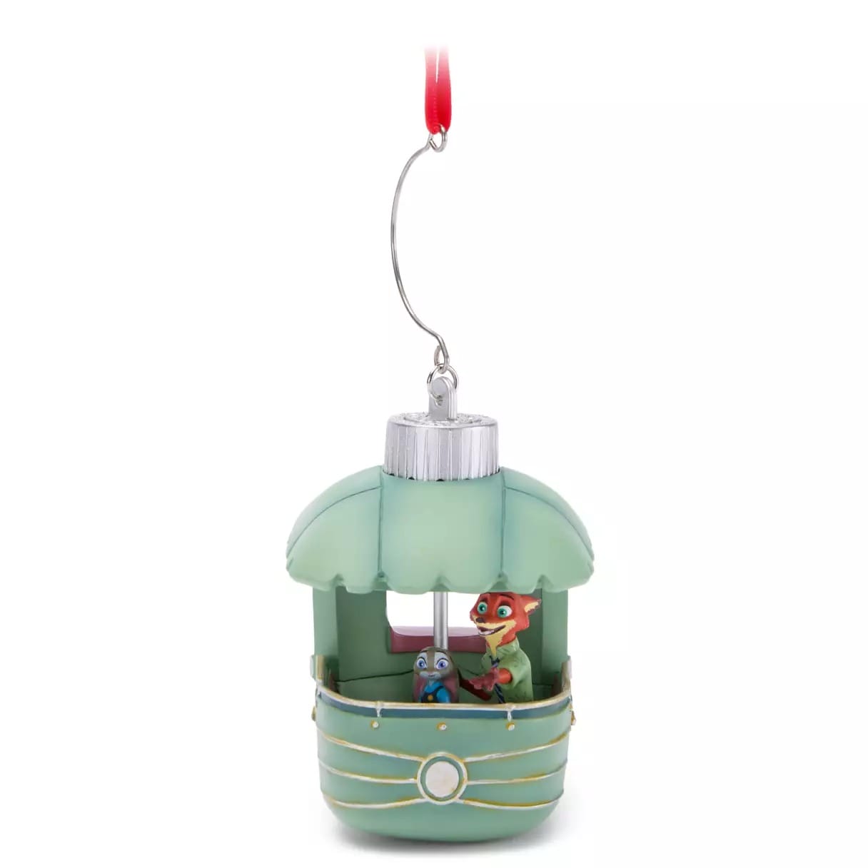 Green gondola Christmas ornament from Disney Store with two animal characters, hanging from a red ribbon and silver hook.