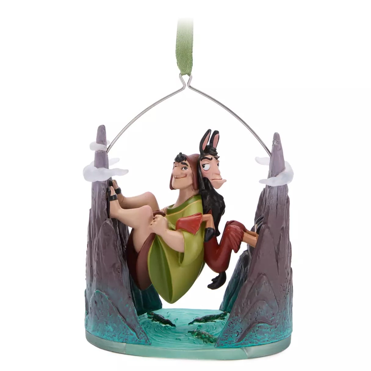 Kronk and llama Kuzco sit back-to-back on a mountain ornament, part of Disney Store’s 2025 Christmas merchandise.